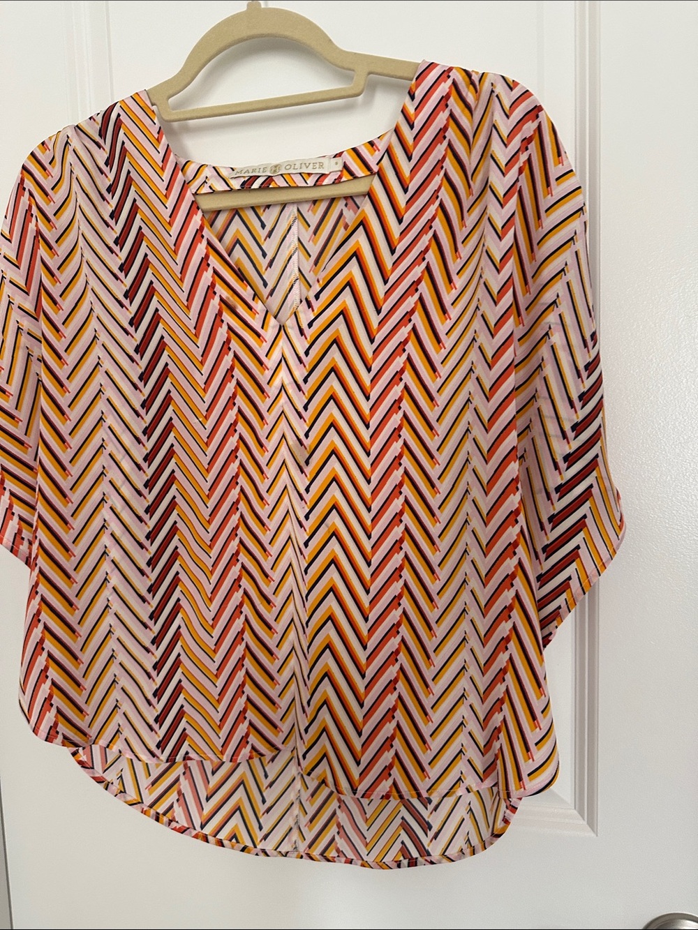 Marie Oliver Chevron Stripe V-Neck Blouse in Pink, Yellow, Orange